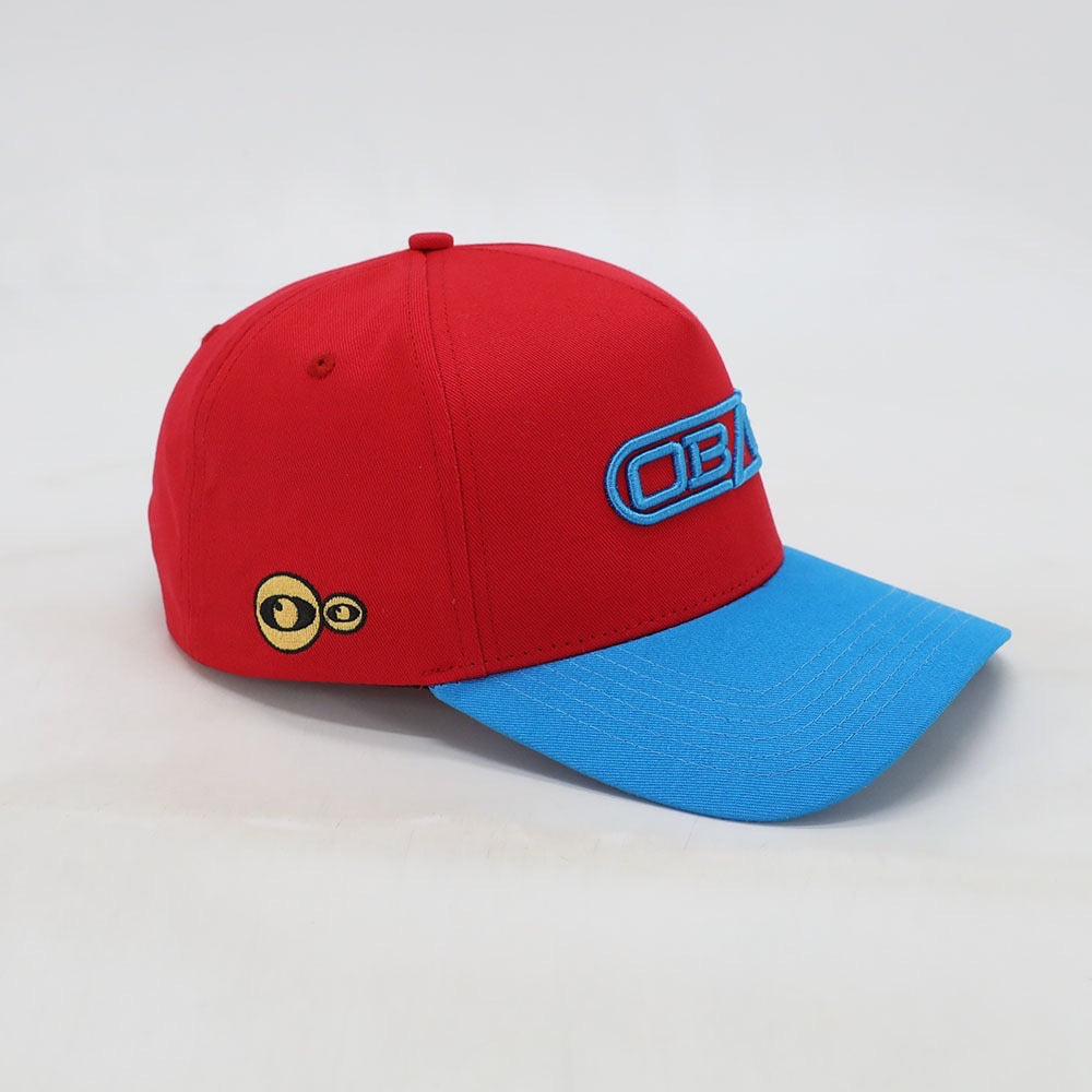 Side view view of OB70 Crème baseball cap