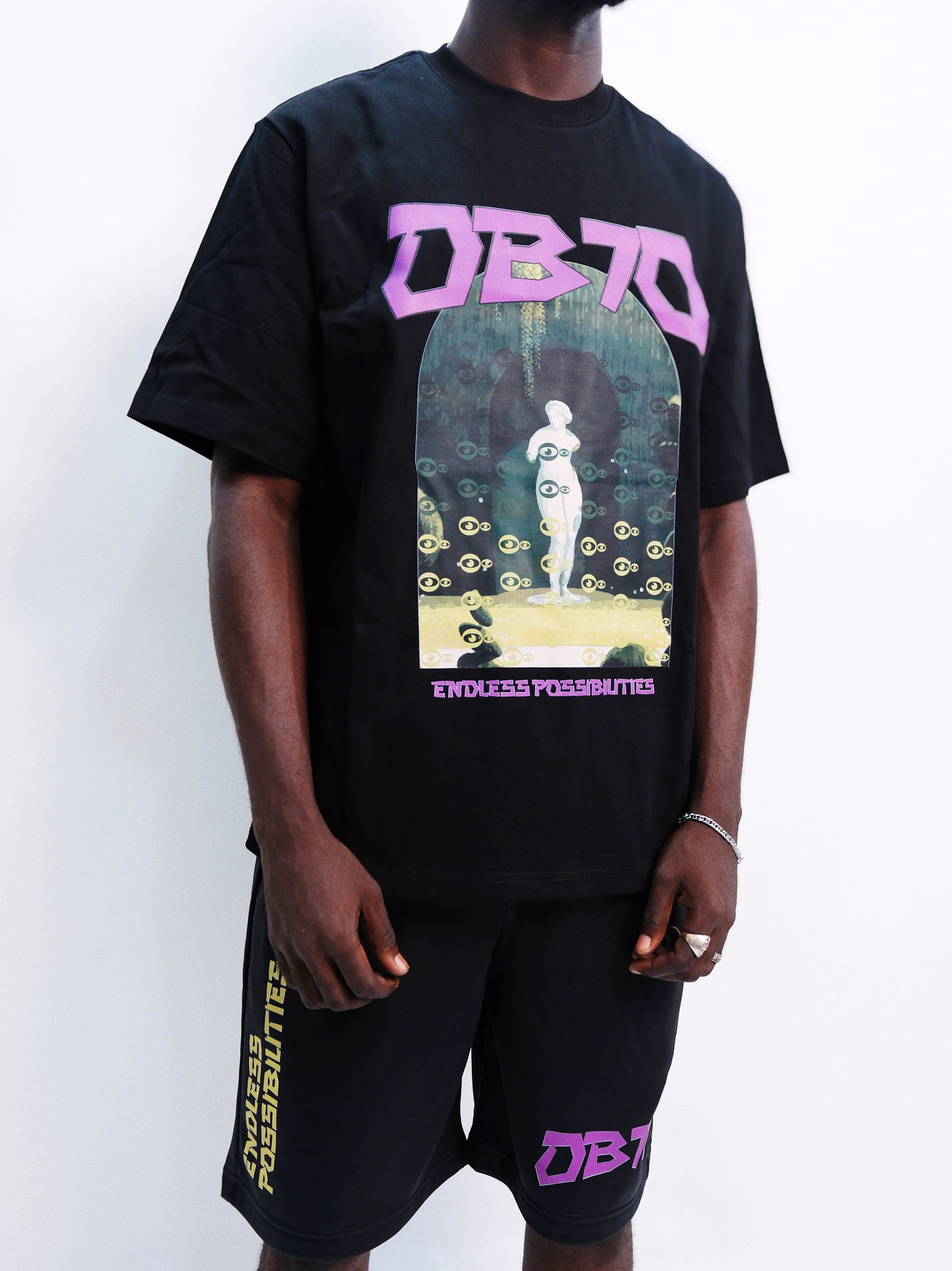 A model wearing Figurine Graphics T-shirt
