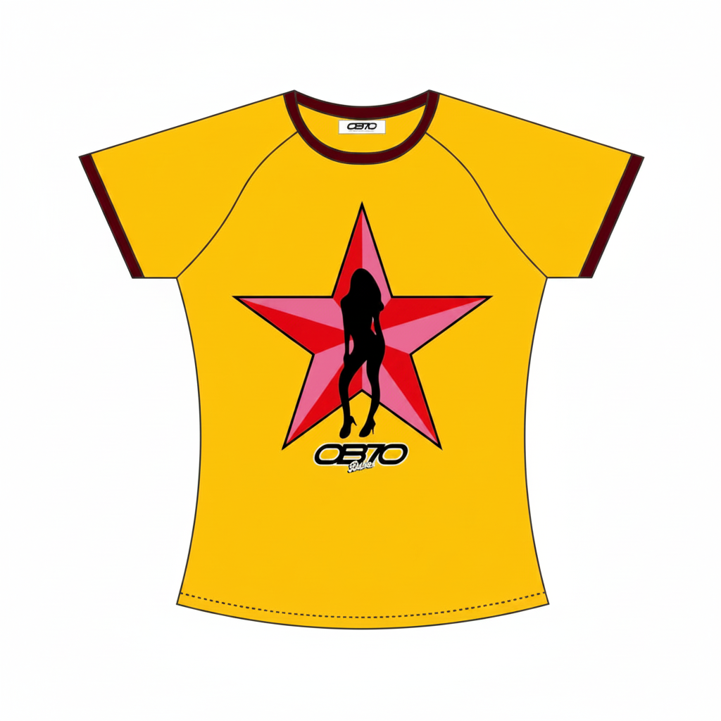 A yellow short-sleeve raglan t-shirt with dark brown trim on the collar and sleeve cuffs, featuring a large red star graphic on the chest with a black silhouette of a woman and the brand name 'OB70 Babes' printed below.