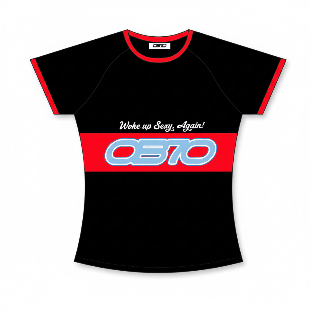 A women's short-sleeve athletic t-shirt in black with a bold red horizontal stripe across the chest, red sleeve trim, and a white graphic text reading 'Woke up Sexy, Again!' above a large stylized 'OB70' logo outlined in blue.