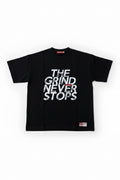 Black OB70  t-shirt with 'The Grind Never Stops' text on a white background