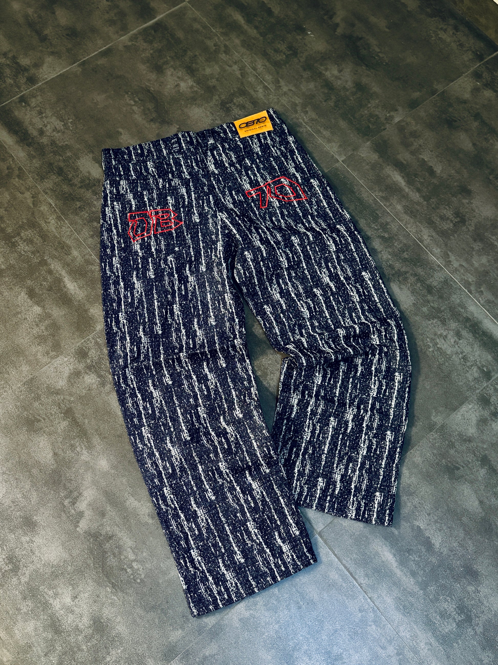 Pair of patterned pants on a concrete floor